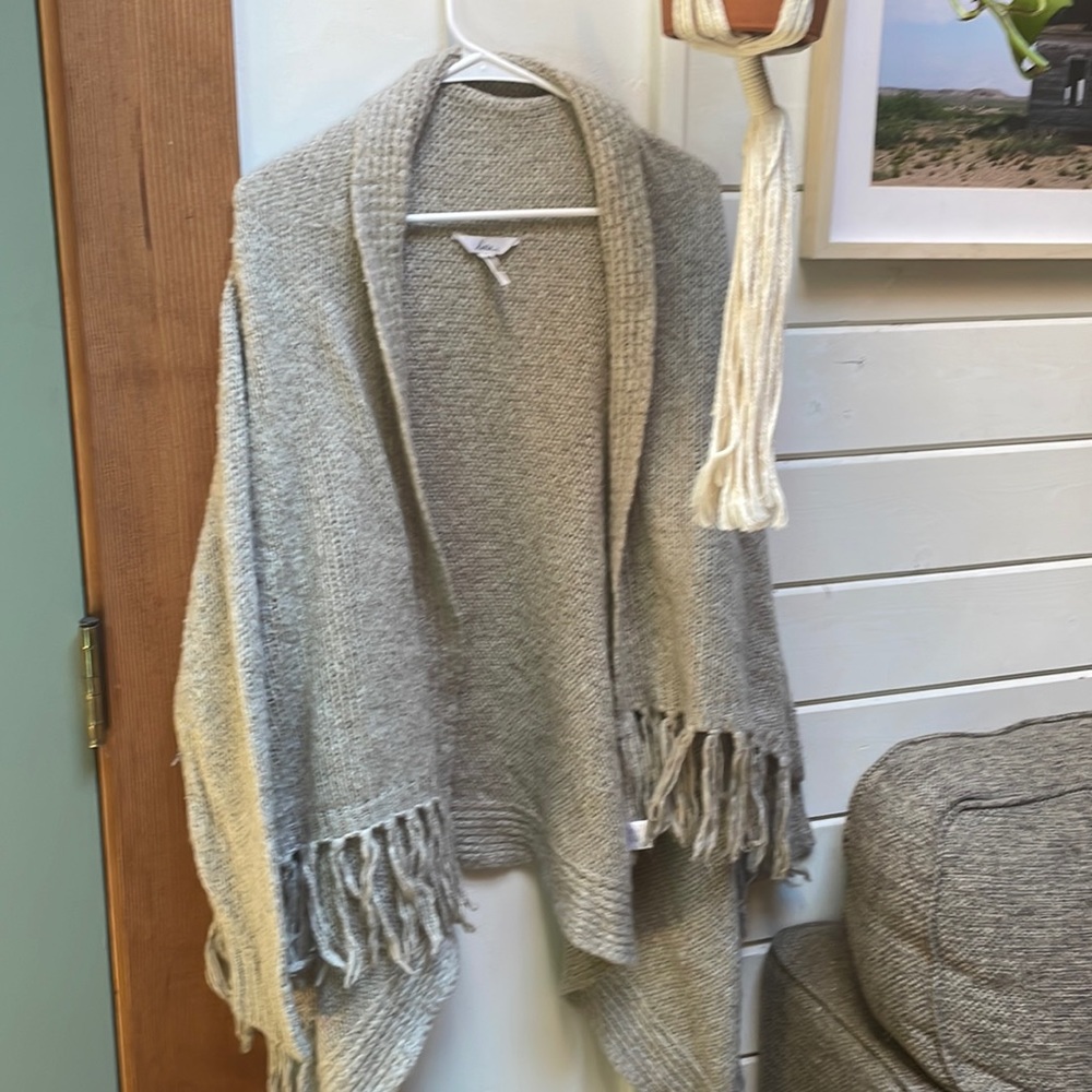 Gray poncho sweater with fringe